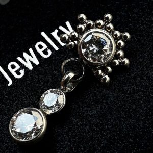 Colgante sol granulado doble cristal 