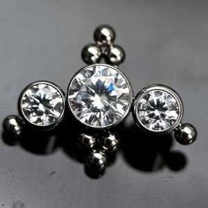 Cluster tres cristales dos tríos esferas